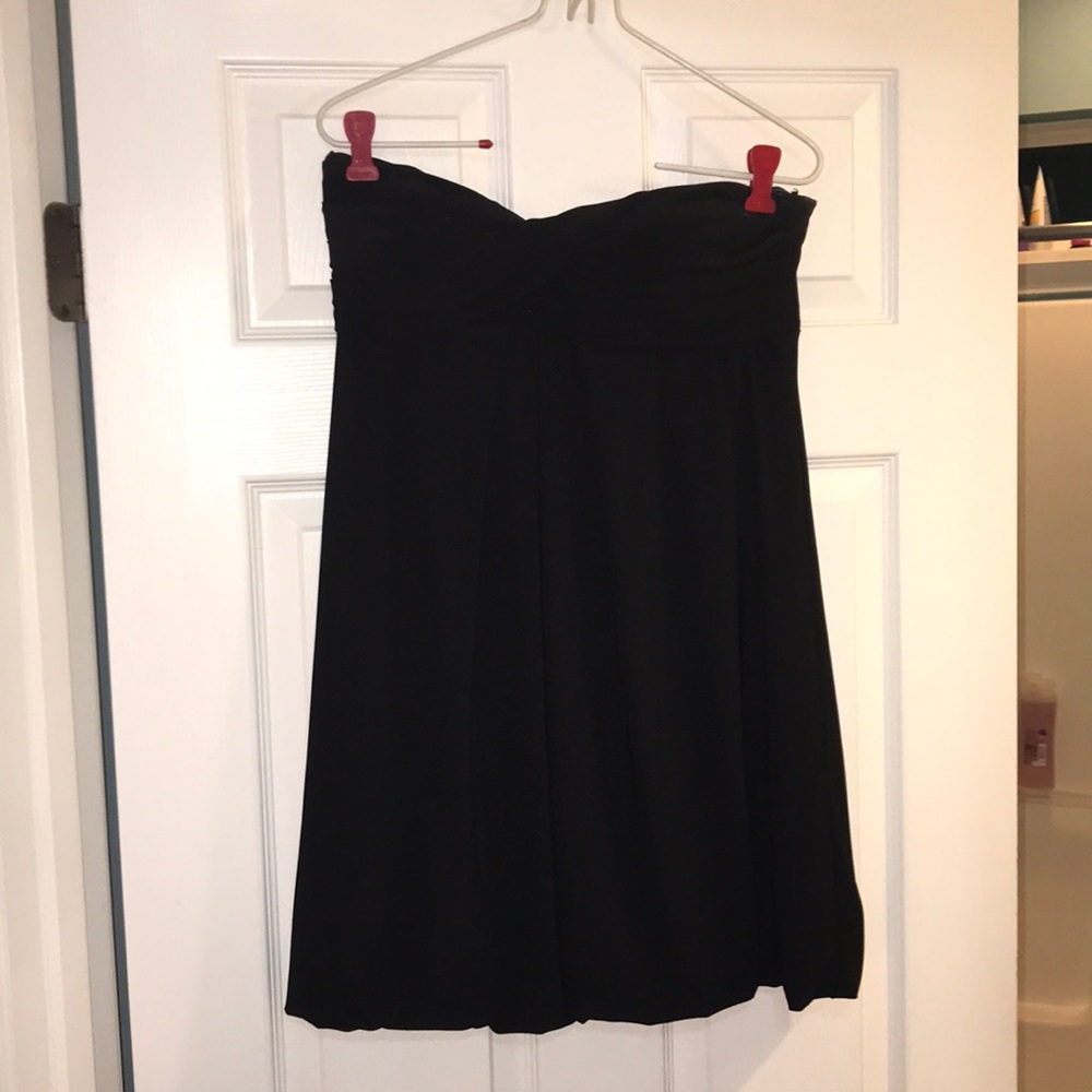 Mini black dress.